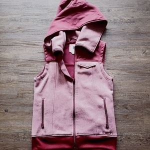 Brand new Burton vest. Burgundy color.